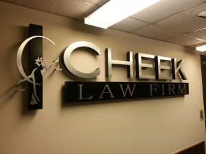 The custom logo sign designed for Cheek Law Firm installed.