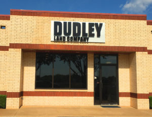Picture of exterior logo sign for Dudley Land Company.