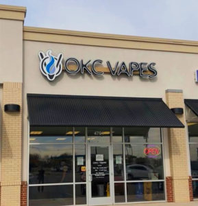 Picture of exterior sign for OKC Vapes in Del City.