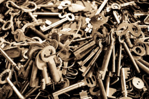 Photograph of a pile of old keys.