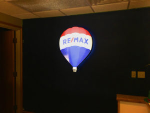 Picture of illuminated balloon for Remax in reception area lobby.